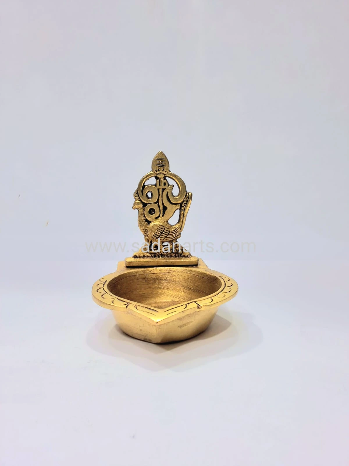 Brass om with murugar deep